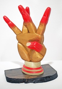 AJ  Fosik -  <strong>West</strong> (2011<strong style = 'color:#635a27'></strong>)<bR /> wood, paint and nails, 
 16.5 x 11.5 x 5 inches 
(41.91 x 29.21 x 12.7 cm)