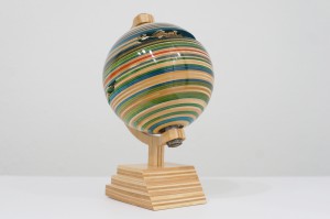 Haroshi    -  <strong>Earth</strong> (2011<strong style = 'color:#635a27'></strong>)<bR /> recycled skateboards and wheel bearing, 
 5 x 7 x 3.75 inches 
(12.7 x 17.78 x 9.53 cm)