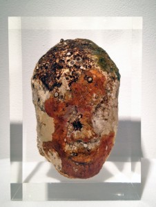 Jason  deCaires Taylor -  <strong>Head 2</strong> (2012<strong style = 'color:#635a27'></strong>)<bR /> cement and resin, 
 11 x 8 x 5 inches 
(27.94 x 20.32 x 12.7 cm)