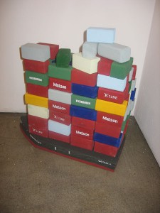 Andrew  Schoultz -  <strong>Untitled Installation</strong> (2006<strong style = 'color:#635a27'></strong>)<bR /> Mixed media with hand sculpted buildings and figures|, 
 Dimensions variable