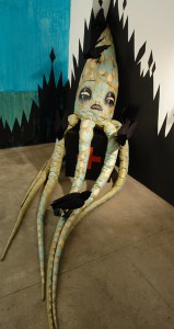 Camille Rose  Garcia -  <strong>Architeuthis Land Marooned</strong> (2006<strong style = 'color:#635a27'></strong>)<bR /> Installation from fabric, wood, paint and glitter, 
 13 x 3 x 7 feet