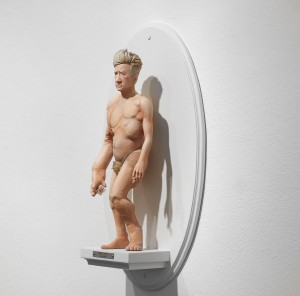 Mike Leavitt -  <strong>David Lynch (side)</strong> (2016<strong style = 'color:#635a27'></strong>)<bR /> hand-carved western red cedar, fimo, sculpey polymer clay and acrylic paint,
18 inches (45.7 cm)