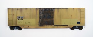 Drew Leshko -  <strong>Yellow Boxcar 40'</strong> (2016<strong style = 'color:#635a27'></strong>)<bR /> paper, enamel, acrylic, dry pigments, wire, ink on wood panel,
12.25 x 40.5 x 2 inches,
(31.11 x 102.87 x 5.08 cm)
