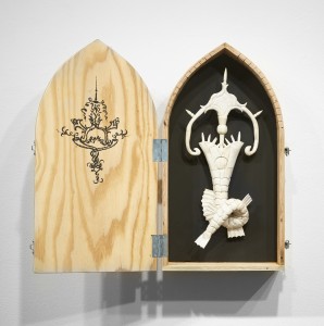 Gary Mellon -  <strong>#17 </strong> (2016<strong style = 'color:#635a27'></strong>)<bR /> carved cow bone and wood in wood box,
21 x 6 x 3 inches,
(53.34 x 15.24 x 7.62 cm)
box: 25.5 x 13.75 x 6 inches,
(64.77 x 34.92 x 15.24 cm)
