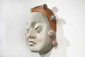 Paolo Del Toro -  <strong>The Visitor (side)</strong> (2016<strong style = 'color:#635a27'></strong>)<bR /> sculpted Styrofoam core covered with hand-dyed needle felted merino wool,
26 x 26 x 13 inches,
(66 x 66 x 33 cm)