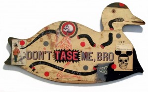 Anthony Freda -  <strong>Don't Tase Me</strong> (2012<strong style = 'color:#635a27'></strong>)<bR /> acrylic and collage on vintage wood cutout,
16 x 26 x 1 inches,
$3,000