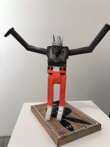 Carlos Ramirez -  <strong>Ghetto Top</strong> (2017<strong style = 'color:#635a27'></strong>)<bR /> Balsa wood, clay, spray paint, acrylic and found objects,
15 x 17.7 x 10.75 inches,
$1,500