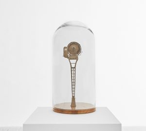 Daniel Agdag -  <strong>The General and Caboose</strong> (2017<strong style = 'color:#635a27'></strong>)<bR /> cardboard mounted on timber base with hand-blown glass dome,
23 x 12 x 12 inches
