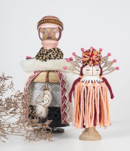 Koralie -  <strong>Ceressea (Goddess of Cultivation) (left) and Selenas (Goddess of the Moon)  (right)</strong> (2018<strong style = 'color:#635a27'></strong>)<bR /> porcelain, wood, fabric and metal,
13 x 7 inches (left), 10 x 6 inches (right)
500 (left) $400 (right)