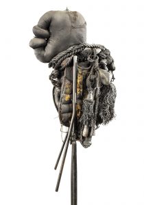 Ronald Gonzalez -  <strong>Fetish (side)</strong> (2015<strong style = 'color:#635a27'></strong>)<bR /> manipulated found objects, wax, wire, soot, metal filings over welded steel,
65 x 13 inches