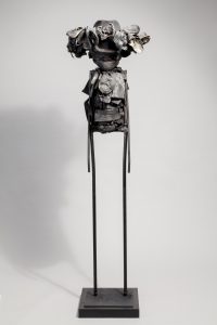Ronald Gonzalez -  <strong>Winged Hat</strong> (2017<strong style = 'color:#635a27'></strong>)<bR /> manipulated found objects, wax, wire, soot, metal filings over welded steel,
65 x 13 inches,
$4,500