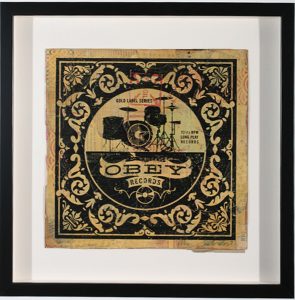 Shepard Fairey -  <strong>Gold Label Drums</strong> (2007<strong style = 'color:#635a27'></strong>)<bR /> hand painted multiple
silkscreen collage on album cover
12 x 12 inches