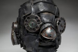 Ronald Gonzalez -  <strong>Distant Call (detail)</strong> (2018<strong style = 'color:#635a27'></strong>)<bR /> black leather, found objects, wire, wax, carbon, screws and metal filings over welded steel armatures,
11 x 8 x 9 inches