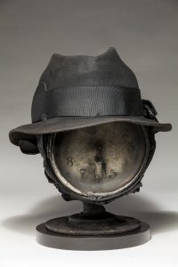Ronald Gonzalez -  <strong>Fear of Time</strong> (2018<strong style = 'color:#635a27'></strong>)<bR /> black leather, found objects, wire, wax, carbon, screws and metal filings over welded steel armatures, 
12 x 10 x 11 inches