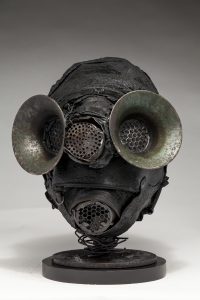Ronald Gonzalez -  <strong>Filters</strong> (2018<strong style = 'color:#635a27'></strong>)<bR /> black leather, found objects, wire, wax, carbon, screws and metal filings over welded steel armatures,
12 x 9 x 11 inches
