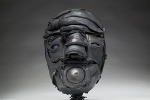 Ronald Gonzalez -  <strong>Gasp</strong> (2018<strong style = 'color:#635a27'></strong>)<bR /> black leather, found objects, wire, wax, carbon, screws and metal filings over welded steel armatures,
12 x 8 x 9 inches
