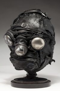 Ronald Gonzalez -  <strong>Mirrors (side)</strong> (2018<strong style = 'color:#635a27'></strong>)<bR /> black leather, found objects, wire, wax, carbon, screws and metal filings over welded steel armatures,
13 x 9 x 10 inches