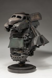 Ronald Gonzalez -  <strong>Mortal</strong> (2018<strong style = 'color:#635a27'></strong>)<bR /> black leather, found objects, wire, wax, carbon, screws and metal filings over welded steel armatures,
14 x 9 x 12 inches