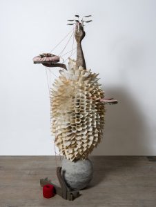 Samuelle Green -  <strong>Untitled 2</strong> (2018<strong style = 'color:#635a27'></strong>)<bR /> paper, rat skeletal remains, found objects and cement,
24 x 24 x 60 inches
