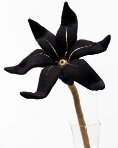 Tara  McPherson -  <strong>The Day's Eye (Black with Gold)</strong> (2010<strong style = 'color:#635a27'></strong>)<bR /> polyester, suede microfiber, bamboo fiber, polyfil, wire and glass eye, 
 20 x 9 x 6.5 inches 
(50.8 x 22.86 x 16.51 cm)
