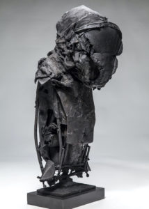 Ronald Gonzalez -  <strong>BLACK TORSO</strong> (2018<strong style = 'color:#635a27'></strong>)<bR /> 26 x 12 x 9. Leather, found objects, wire, wax, carbon, screws, and metal filings over welded steel armatures