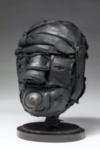Ronald Gonzalez -  <strong>GASP</strong> (2018<strong style = 'color:#635a27'></strong>)<bR /> 12 x 8 x 8. Leather, found objects, wire, wax, carbon, screws, and metal filings over welded steel armatures.