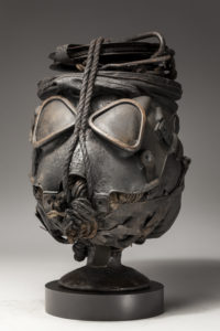 Ronald Gonzalez -  <strong>HALO</strong> (2018<strong style = 'color:#635a27'></strong>)<bR /> 16 X 9 X 10. Leather, found objects, wire, wax, carbon, screws, and metal filings over welded steel armatures.