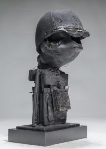 Ronald Gonzalez -  <strong>HOLE</strong> (2017<strong style = 'color:#635a27'></strong>)<bR /> 21 x 12 x 8. Leather, found objects, wire, wax, carbon, screws, and metal filings over welded steel armatures.