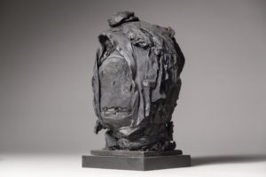 Ronald Gonzalez -  <strong>MEMENTO MORI 3</strong> (2017<strong style = 'color:#635a27'></strong>)<bR /> 11 x 7 x 7. Leather, found objects, wire, wax, carbon, screws, and metal filings over welded steel armatures.