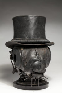 Ronald Gonzalez -  <strong>RABBIT AND HAT</strong> (2017<strong style = 'color:#635a27'></strong>)<bR /> 14 x 9 x 13 - Leather, found objects, wire, wax, carbon, screws, and metal filings over welded steel armatures.