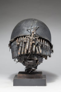 Ronald Gonzalez -  <strong>WAR RELICS # 4</strong> (2018-19<strong style = 'color:#635a27'></strong>)<bR /> Approx. 12 x 11 x 12. Leather, found objects, wire, wax, carbon, screws, and metal filings over welded steel armatures