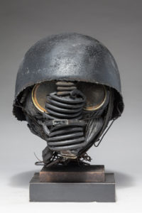 Ronald Gonzalez -  <strong>WAR RELICS # 5</strong> (2018-19<strong style = 'color:#635a27'></strong>)<bR /> Approx. 12 x 11 x 12. Leather, found objects, wire, wax, carbon, screws, and metal filings over welded steel armatures
