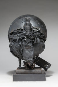 Ronald Gonzalez -  <strong>WAR RELICS # 7</strong> (2018-19<strong style = 'color:#635a27'></strong>)<bR /> Approx. 12 x 11 x 12. Leather, found objects, wire, wax, carbon, screws, and metal filings over welded steel armatures