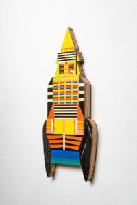 Kumkum Fernando -  <strong>Temple Rocket,</strong> (2024<strong style = 'color:#635a27'></strong>)<bR /> Mixed media — up-cycled wooden frame 
and stainless steel, brass embellishments,
H40 x W17 x D3